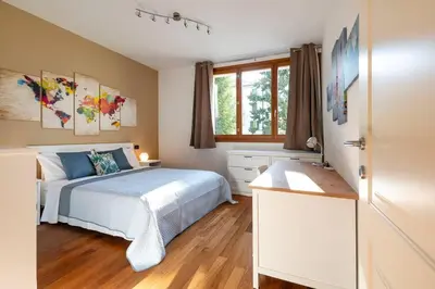 Letto o letti in una camera di enJoy Home - appartamento I Papaveri