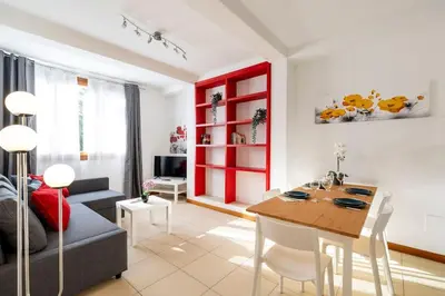 Area soggiorno di enJoy Home - appartamento I Papaveri