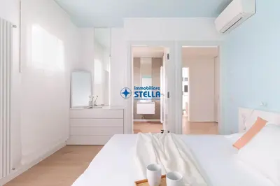Letto o letti in una camera di Golf Jesolo Village