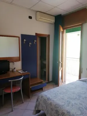 Letto o letti in una camera di Hotel Trifoglio