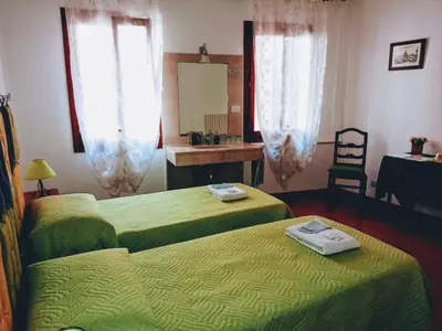 Letto o letti in una camera di Casa Favaretto Guest House