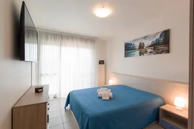 Letto o letti in una camera di Anna