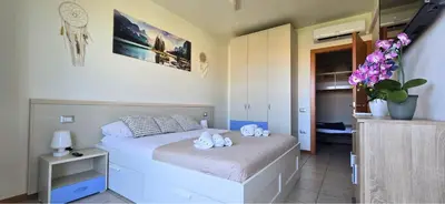Letto o letti in una camera di Anna