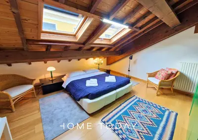 Letto o letti in una camera di HT - Casa dell'artista in Piazza delle Erbe