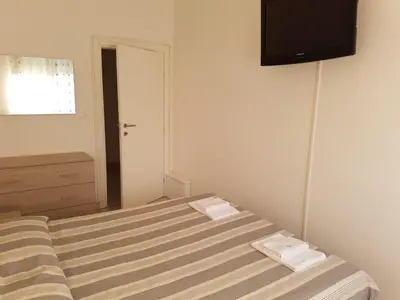 Letto o letti in una camera di Sottomarina Beach apartment