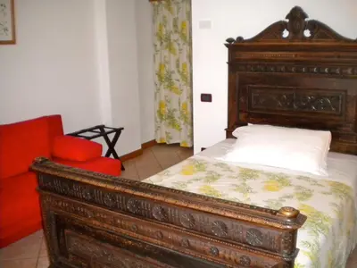 Letto o letti in una camera di Agriturismo Il Magicorto
