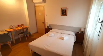 Letto o letti in una camera di Casa Vilma