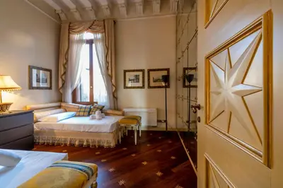 Letto o letti in una camera di Ca' De Le Colonne - Luxury Grand Canal View