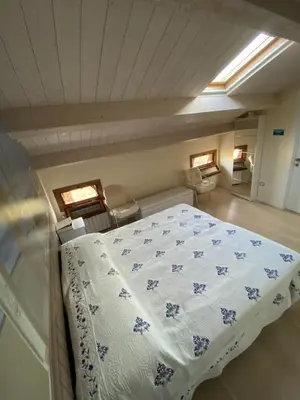 Letto o letti in una camera di Fairmont Residence Elisabetta by Ca-Sa Check