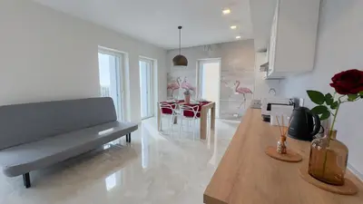 Cucina o angolo cottura di Fairmont Seafront Flamingo Suite by Ca-Sa Check
