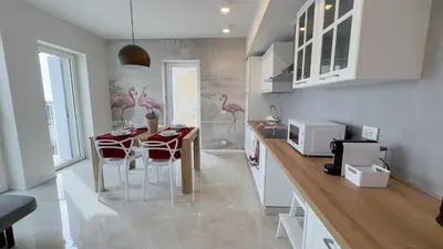 Cucina o angolo cottura di Fairmont Seafront Flamingo Suite by Ca-Sa Check