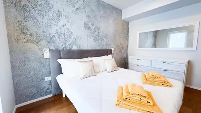 Letto o letti in una camera di Fairmont Seafront Venice Suite by Ca-Sa Check