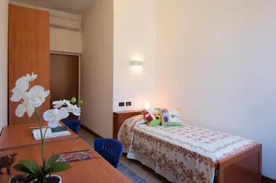 Letto o letti in una camera di Casa Battisti