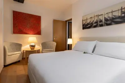 Letto o letti in una camera di The Silk House by LionHost