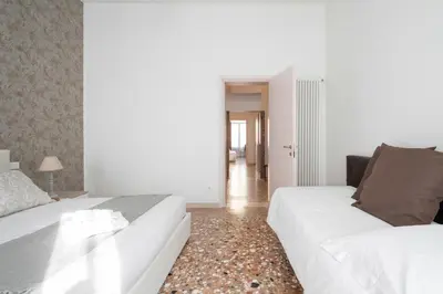 Letto o letti in una camera di Accademia Charm Apartments by Wonderful Italy