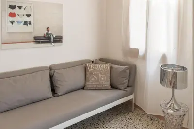 Area soggiorno di Accademia Charm Apartments by Wonderful Italy