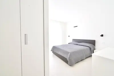 Letto o letti in una camera di L14 Apartments