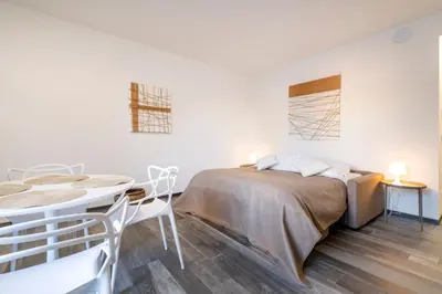 Letto o letti in una camera di Palazzo Ruzante Padova - Atene Apt