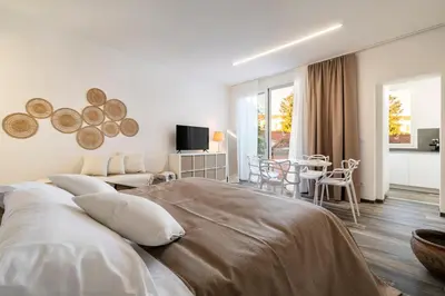 Letto o letti in una camera di Palazzo Ruzante Padova - Atene Apt