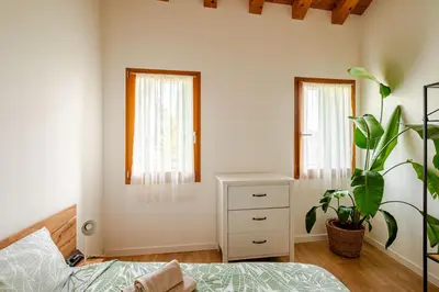 Letto o letti in una camera di Ca Mantoet - 3Bedroom Loft