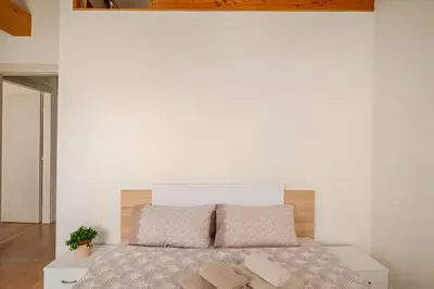 Letto o letti in una camera di Ca Mantoet - 3Bedroom Loft
