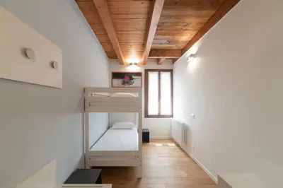 Letto o letti in una camera di Dimora Acquamarina