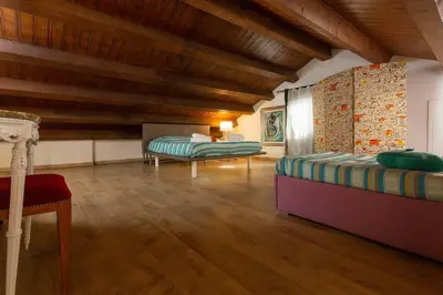 Letto o letti in una camera di San Marco Comfort