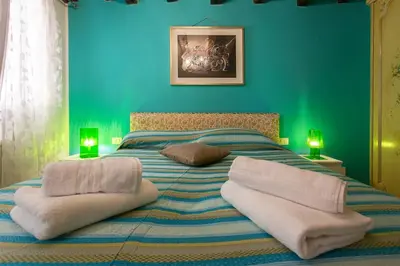 Letto o letti in una camera di San Marco Comfort