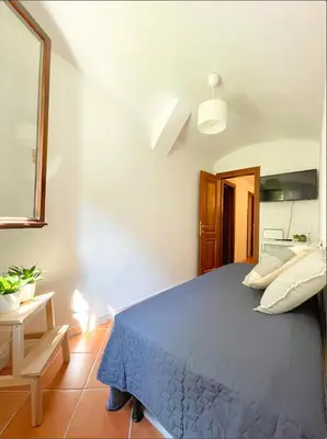 Letto o letti in una camera di Casa Alleria Venezia Cozy Apartment by Rialto Bridge