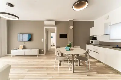 Cucina o angolo cottura di Sun Beach Residence con Piscina - Piazza Brescia - Adria Holiday Jesolo - FAMILY APARTMENTS