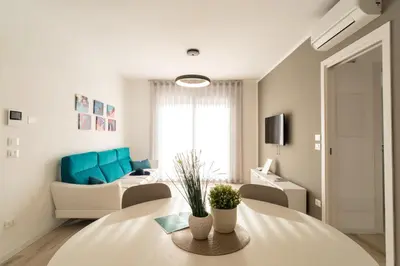 Area soggiorno di Sun Beach Residence con Piscina - Piazza Brescia - Adria Holiday Jesolo - FAMILY APARTMENTS