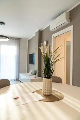 TV o dispositivi per l'intrattenimento presso Sun Beach Residence con Piscina - Piazza Brescia - Adria Holiday Jesolo - FAMILY APARTMENTS