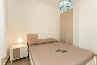 Letto o letti in una camera di Trilocale VI20, Condominio Vicenza - Adria Holiday Jesolo - FAMILY APARTMENT