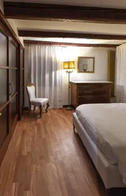 Letto o letti in una camera di LaLux Venezia