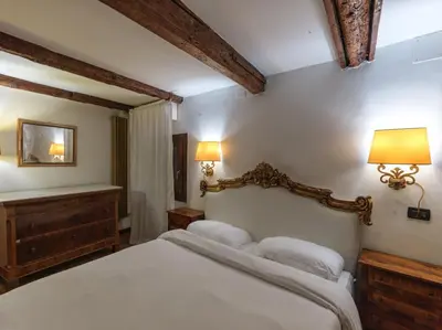 Letto o letti in una camera di LaLux Venezia