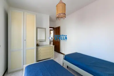Letto o letti in una camera di Villa Mimosa