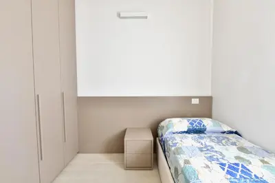 Letto o letti in una camera di Wave Village 2 Apartments