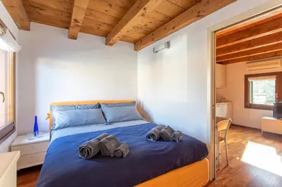 Letto o letti in una camera di Comodo Apt Centrale