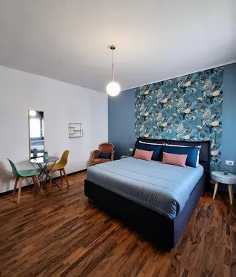 Letto o letti in una camera di Maison Mojan B&B - Tra Venezia e Treviso
