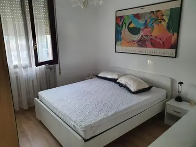 Letto o letti in una camera di Appartamento Fiera