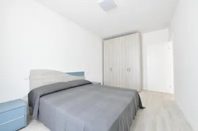 Letto o letti in una camera di Wave Plus Apartments