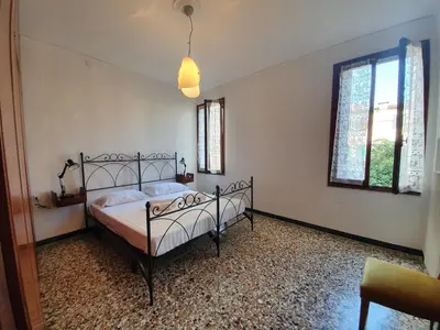 Letto o letti in una camera di Apt. Magno, con doppia terrazza e vista mozzafiato