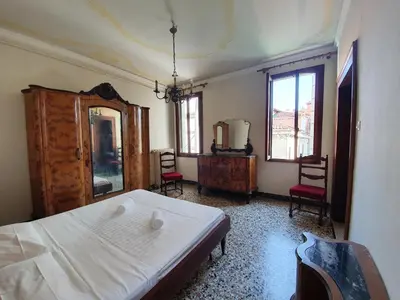 Letto o letti in una camera di Apt. Magno, con doppia terrazza e vista mozzafiato