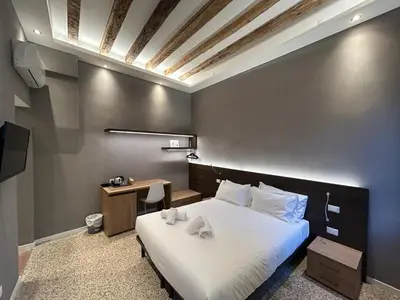 Letto o letti in una camera di Ca' Piasentin