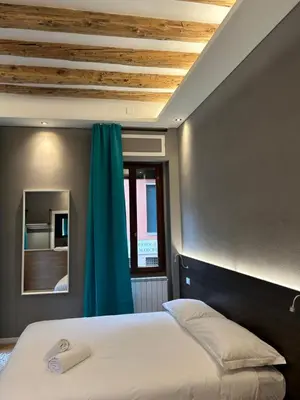 Letto o letti in una camera di Ca' Piasentin