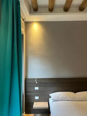 Letto o letti in una camera di Ca' Piasentin