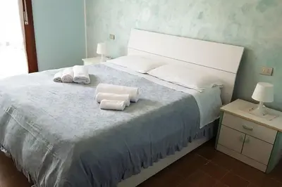 Letto o letti in una camera di Appartamento Vista Mare Jesolo.
