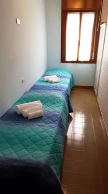 Letto o letti in una camera di Appartamento Vista Mare Jesolo.