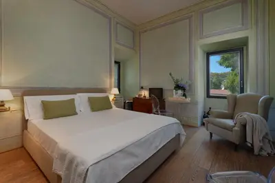 Letto o letti in una camera di Massimago Wine Tower