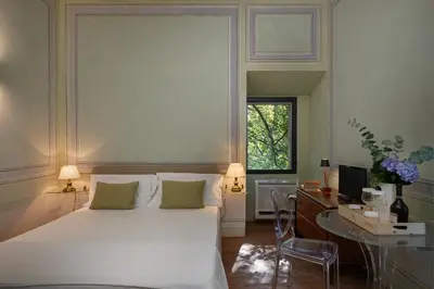 Letto o letti in una camera di Massimago Wine Tower